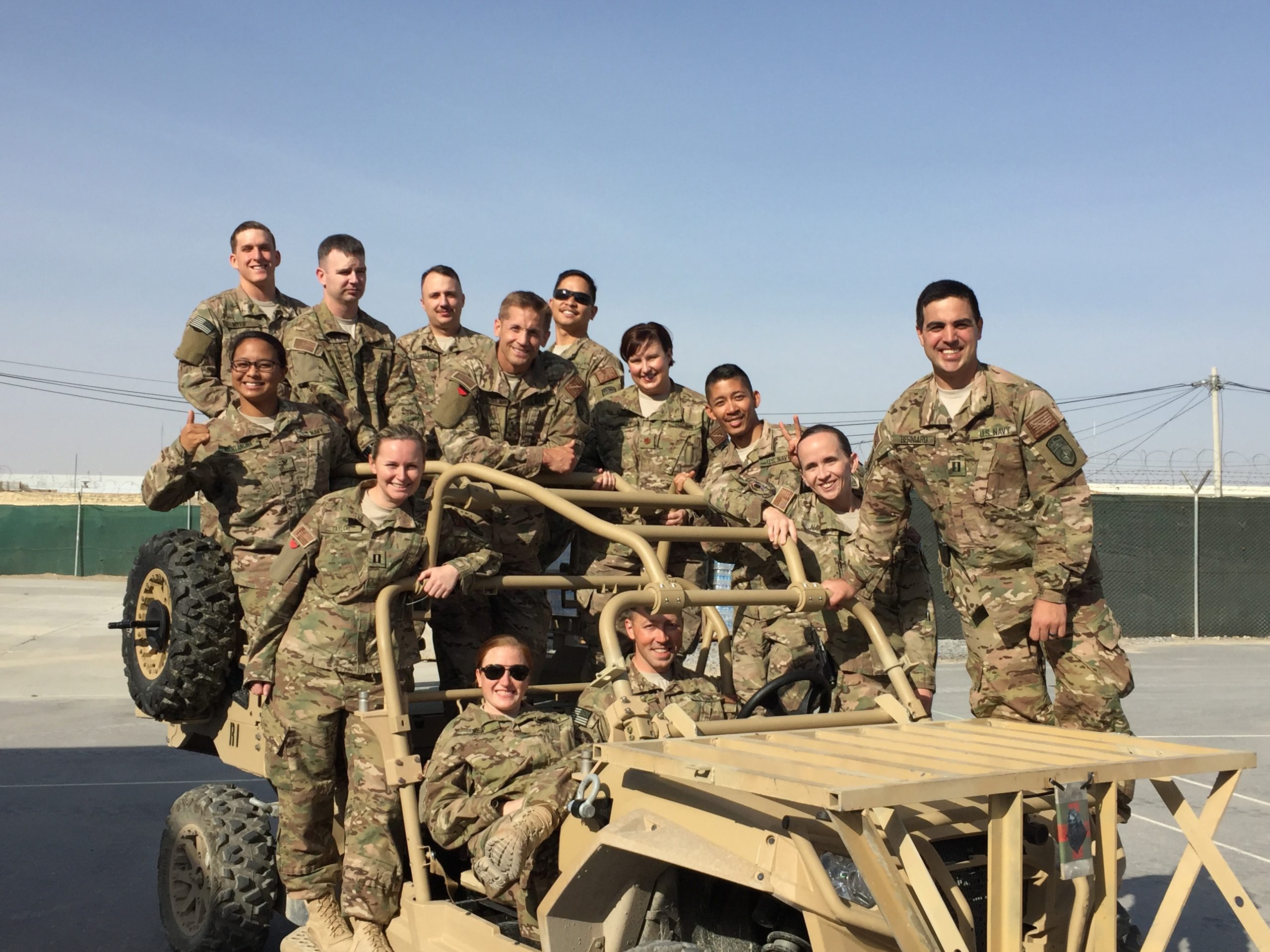 Rich McCormick with fellow servicemembers in the field